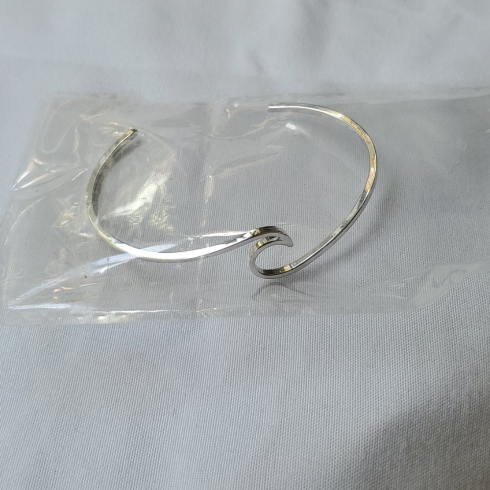 Sterling silver wave bracelet.